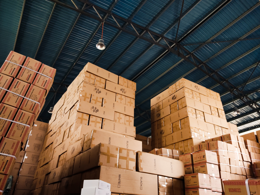 Warehouse with pallets and forklifts